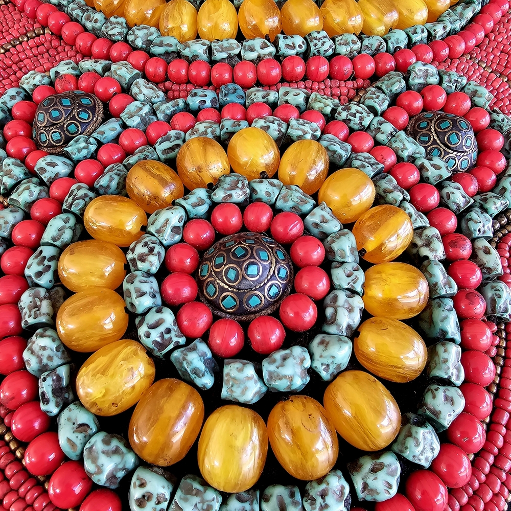 Intricate Red and Yellow Beaded Necklace with Circular Patterns